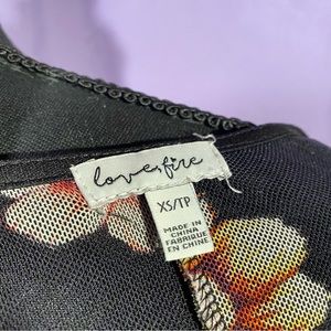 lovefire brand sheer mesh orange and pink floral tee, lettuce hem